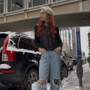 Black Quilted Bomber Jacket with Gold Accents